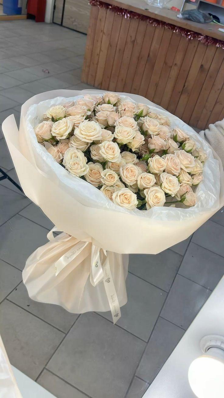 Corporate meeting room with carefully timed floral arrangements that maintain elegance throughout business hours